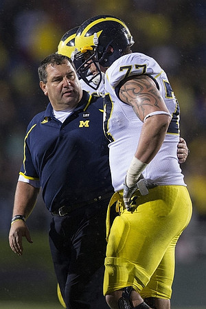 Brady Hoke and Taylor Lewan (77)