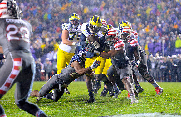Michael Schofield (75) and Devin Gardner (98)