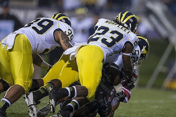 Sione Houma (39) and Dennis Norfleet (23)