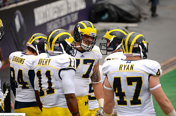 Brendan Gibbons (34), Courtney Avery (11), Taylor Lewan (77), and Jake Ryan (47)