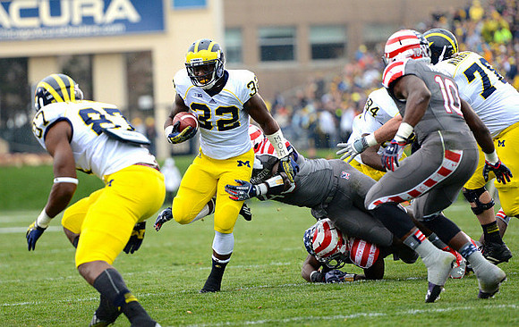 Devin Funchess (87), De'Veon Smith (32), A.J. Williams (84), and Erik Magnuson (78)
