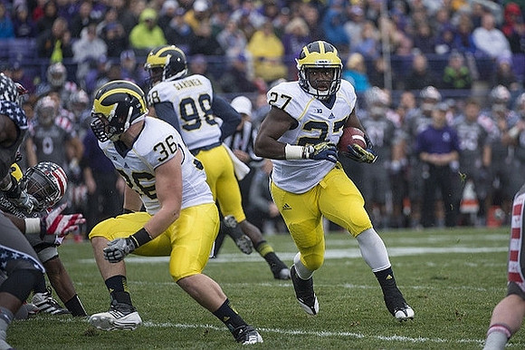 Joe Kerridge (36), Derrick Green (27), and Devin Gardner (98)