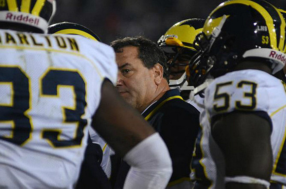 Taco Charlton (33), Brady Hoke, and Mario Ojemudia (53)