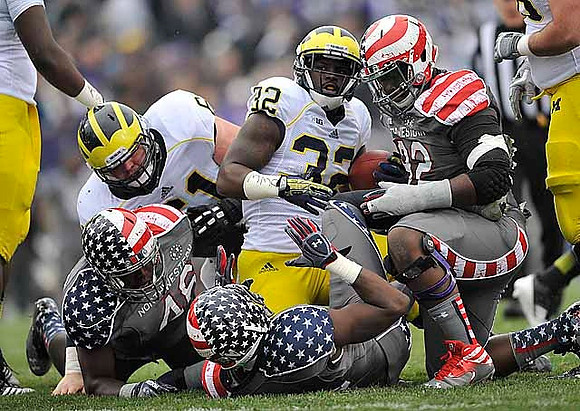 Graham Glasgow (61) and De'Veon Smith (32)