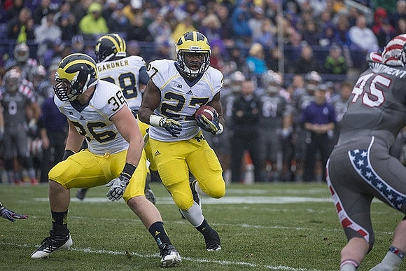 Joe Kerridge (36), Derrick Green (27), and Devin Gardner (98)
