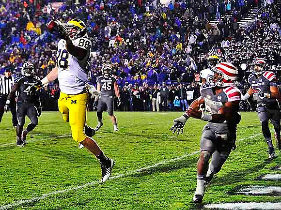 Jake Butt (88) and Devin Funchess (87)