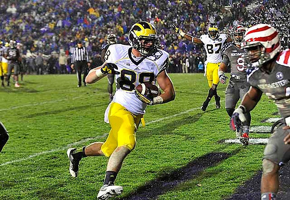 Jake Butt (88) and Devin Funchess (87)