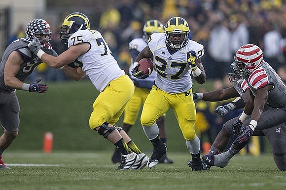 Michael Schofield (75), Derrick Green (27), and Devin Gardner (98)