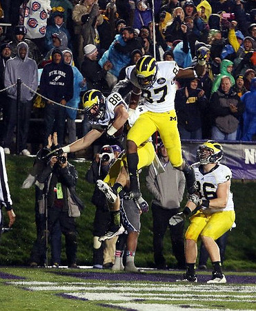 Jake Butt (88), Devin Funchess (87), and Joe Kerridge (36)
