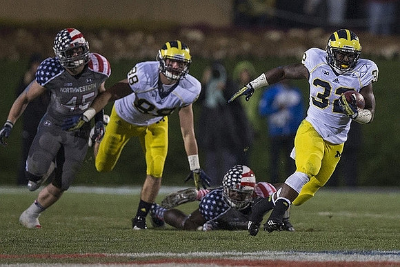 Jake Butt (88) and De'Veon Smith (32)