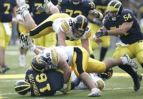 Adrian Arrington, Chad Henne, Rueben Riley Jr., Alex Mitchell, and Mark Bihl