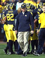 Lloyd Carr, LaTerryal Savoy, and Andre Criswell