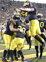 Michael Hart, Brian Thompson, Mark Bihl, Chad Henne, and Obi Oluigbo