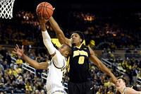Muhammad-Ali Abdur-Rahkman (12) and Ricky Doyle (32)