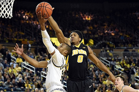 Muhammad-Ali Abdur-Rahkman (12) and Ricky Doyle (32)