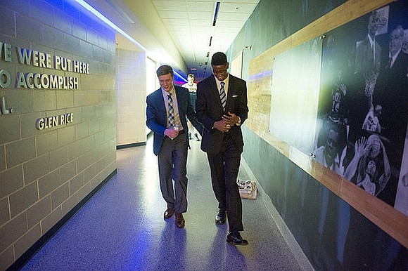 Spike Albrecht (2) and Caris LeVert (23)