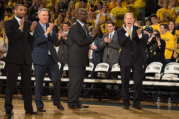 LaVall Jordan, Jeff Meyer, Bacari Alexander, and John Beilein