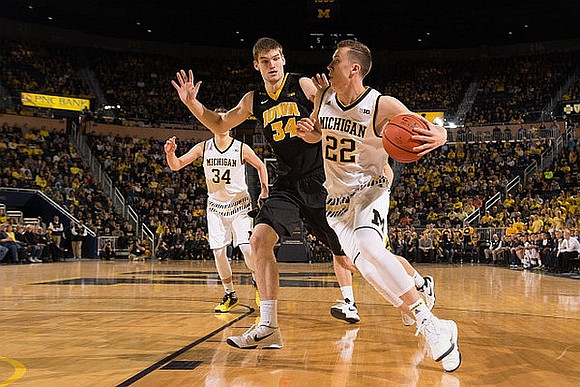 Mark Donnal (34) and Duncan Robinson (22)