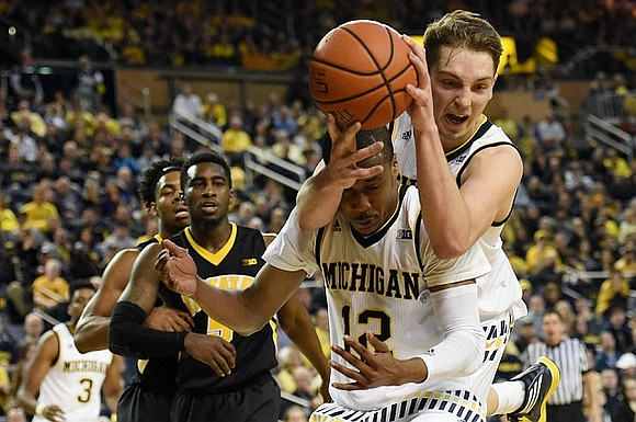 Kameron Chatman (3), Muhammad-Ali Abdur-Rahkman (12), and Mark Donnal (34)
