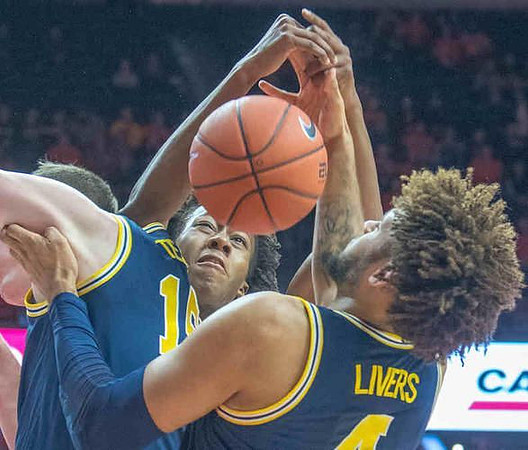 Jon Teske (15) and Isaiah Livers (4)