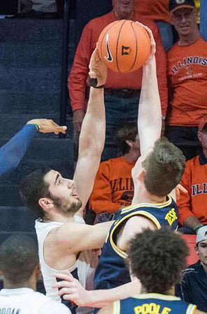 Jon Teske (15) and Jordan Poole (2)