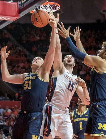Austin Davis (51) and Isaiah Livers (4)