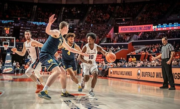 Jon Teske (15) and Isaiah Livers (4)
