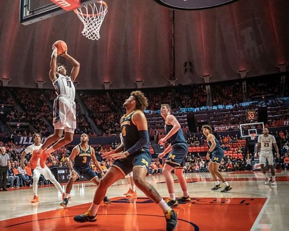 Zavier Simpson (3), Isaiah Livers (4), Jon Teske (15), and Jordan Poole (2)