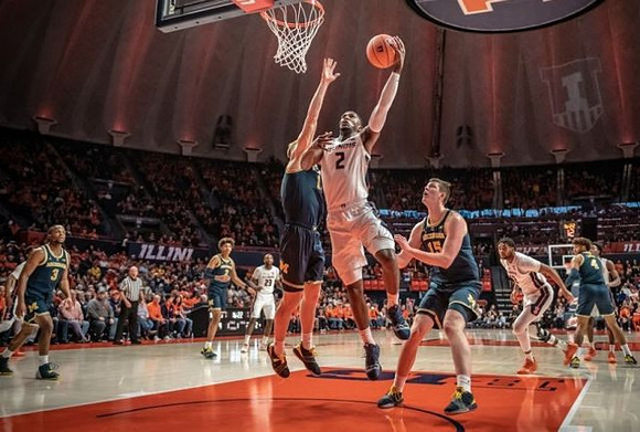 Zavier Simpson (3), Jordan Poole (2), Ignas Brazdeikis (13), Jon Teske (15), and Isaiah Livers (4)