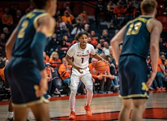 Jordan Poole (2) and Ignas Brazdeikis (13)