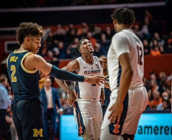Jordan Poole (2) and Zavier Simpson (3)