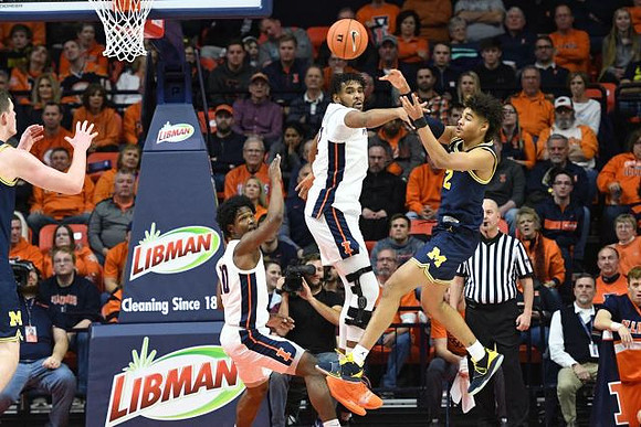 Jon Teske (15) and Jordan Poole (2)