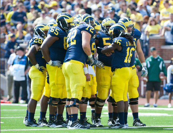 Fitzgerald Toussaint (28), Patrick Omameh (65), Mark Huyge (72), Ricky Barnum (52), and Denard Robinson (16)
