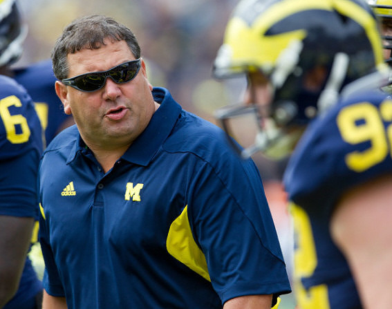 Brady Hoke and Keith Heitzman (92)