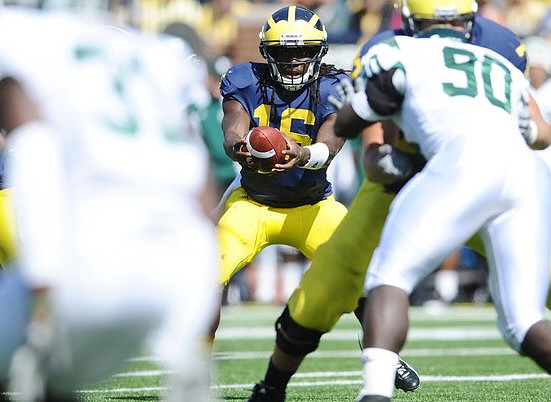 Denard Robinson (16) and Taylor Lewan (77)
