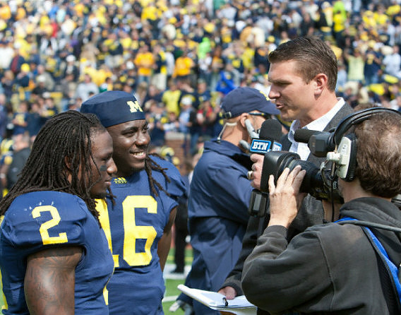 Vincent Smith (2), Denard Robinson (16), and Jon Jansen