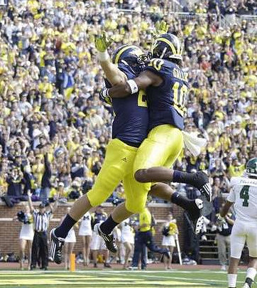 Drew Dileo (26) and Jeremy Gallon (10)