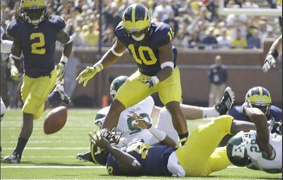 Vincent Smith (2), Jeremy Gallon (10), and Denard Robinson (16)