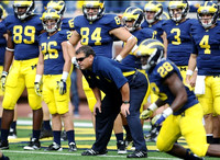 Brandon Moore (89), Drew Dileo (26), Steve Watson (84), Fitzgerald Toussaint (28), Brady Hoke, Russell Bellomy (3), and Steve Wilson (4)