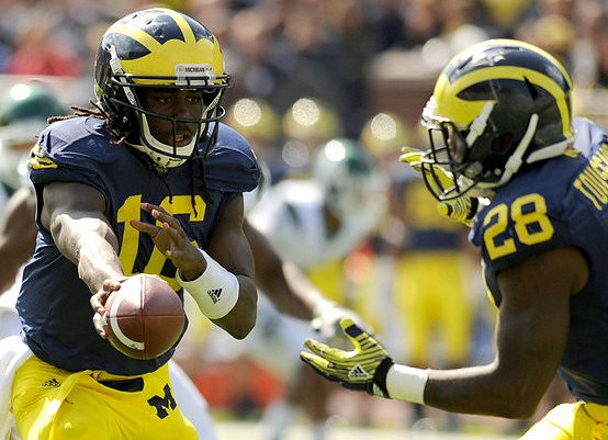 Denard Robinson (16) and Fitzgerald Toussaint (28)