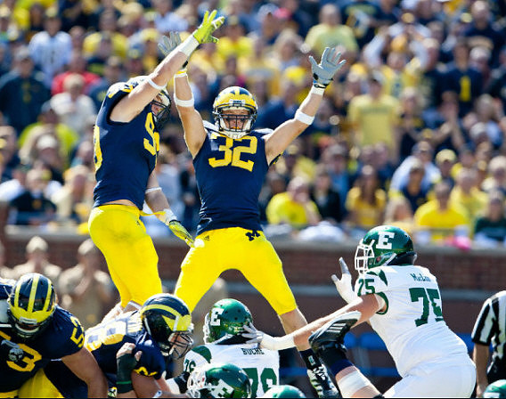 Ryan Van Bergen (53), Mike Martin (68), Jake Ryan (90), and Jordan Kovacs (32)