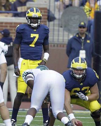 Devin Gardner (7) and Rocko Khoury (63)