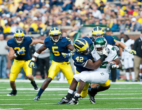 Jared Van Slyke (31), Courtney Avery (5), and J.B. Fitzgerald (42)