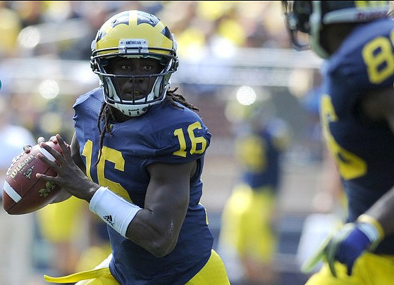 Denard Robinson (16) and Kevin Koger (86)