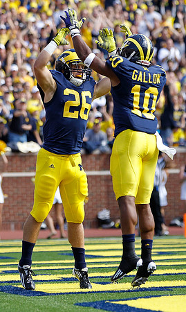 Drew Dileo (26) and Jeremy Gallon (10)