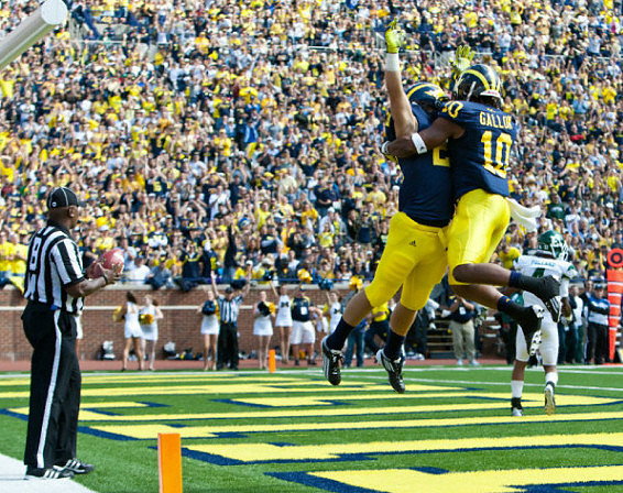 Drew Dileo (26) and Jeremy Gallon (10)