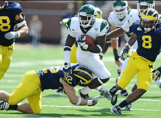 Jordan Kovacs (32) and J.T. Floyd (8)