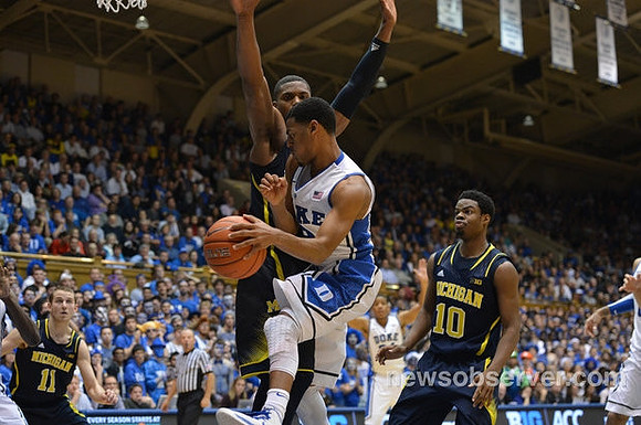 Nik Stauskas (11), Glenn Robinson III (1), and Derrick Walton Jr. (10)