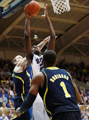 Nik Stauskas (11) and Glenn Robinson III (1)