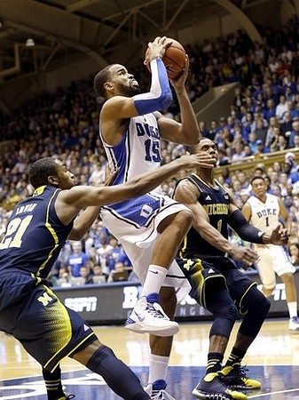 Zak Irvin (21) and Glenn Robinson III (1)